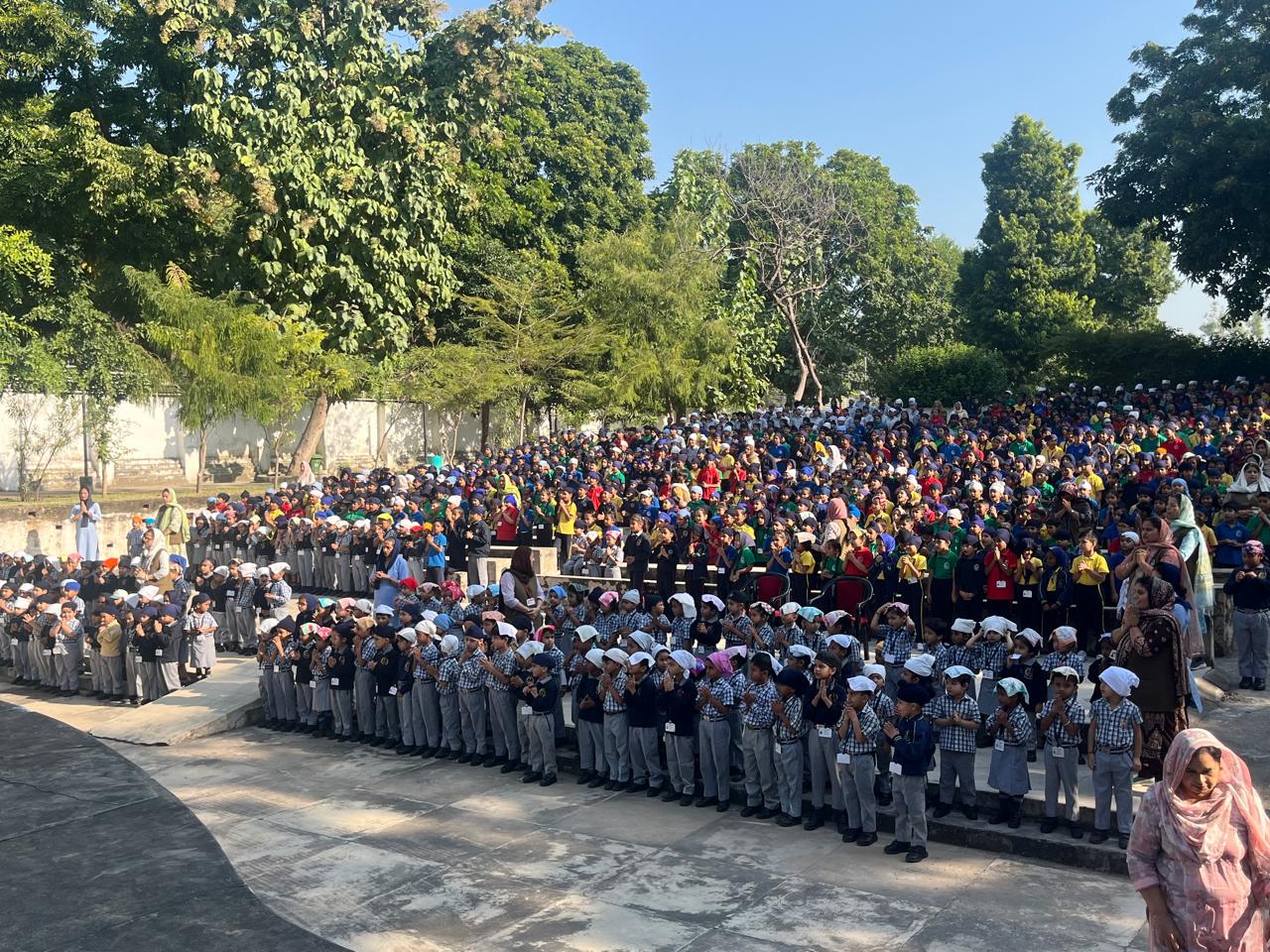 School assembly paying reverence